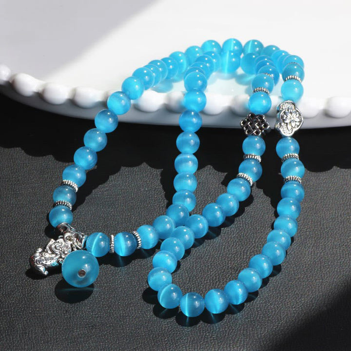 Bracelet triple tour de soutien PiXiu œil de chat en Buddha Stones
