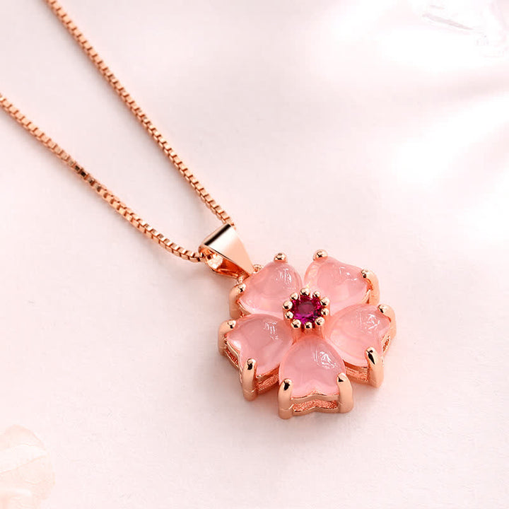 Collier avec pendentif apaisant en forme de cœur et de fleur en cristal rose de Buddha Stones