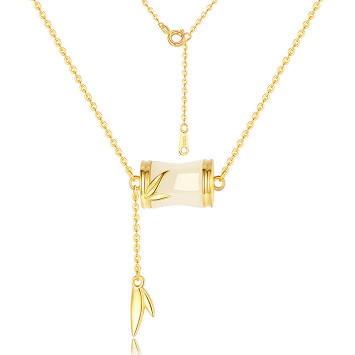 Collier pendentif porte-bonheur en feuille de bambou en jade blanc Hetian en argent sterling 925 et or 22 carats avec Buddha Stones