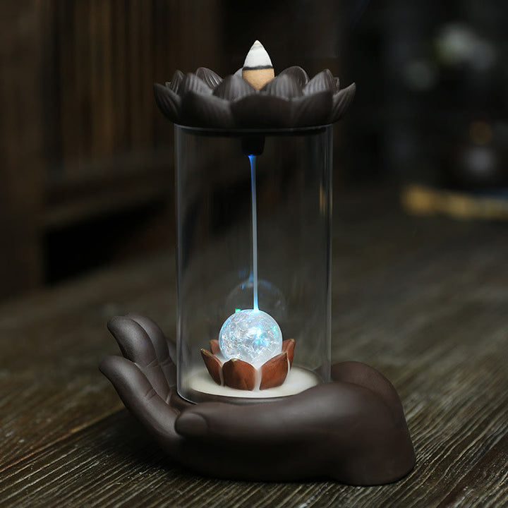 Buddha Stones Main de Bouddha Lotus Illumination Lumière LED Brûleur d'encens en céramique en argile violette Décoration