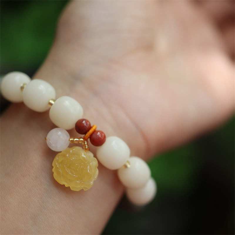 Bracelet de paix en ambre et graines de Bodhi avec Buddha Stones dégradées