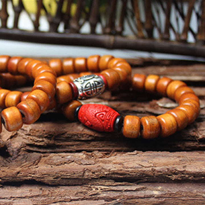 Bracelet de force en Buddha Stones, perles d'os tibétaines Om Mani Padme Hum