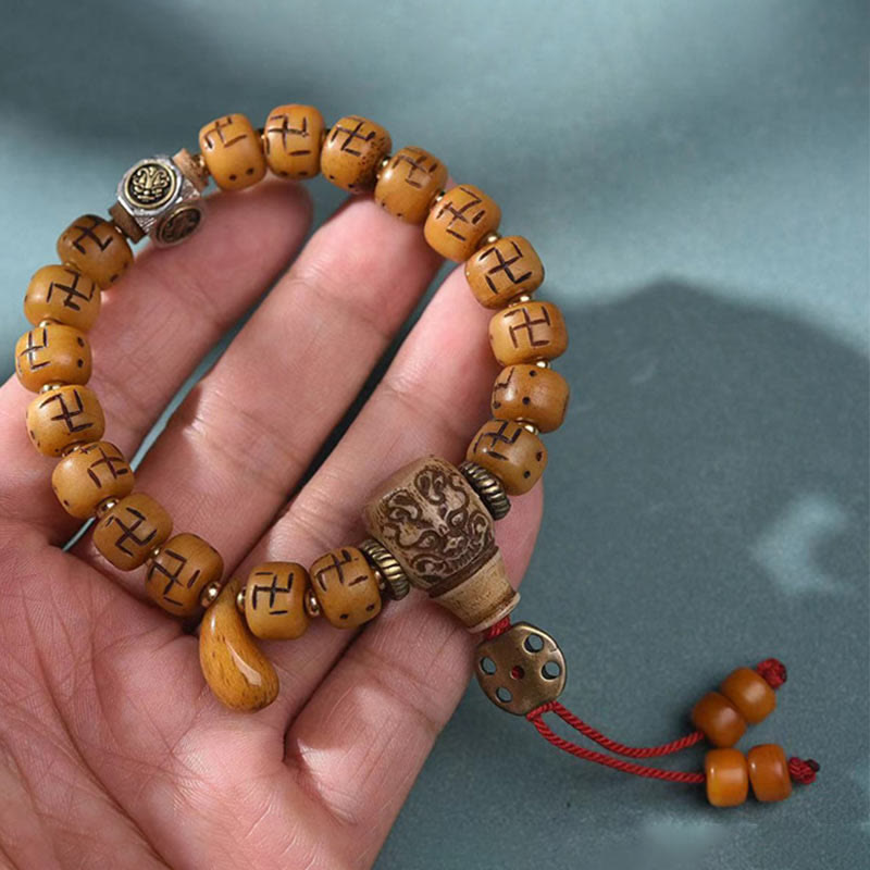 Buddha Stones en os de chameau tibétain naturel, croix gammée Dzi, perle Shankha, breloque de bouddha Kirtimukha, Bracelet à pompon de Protection porte-bonheur