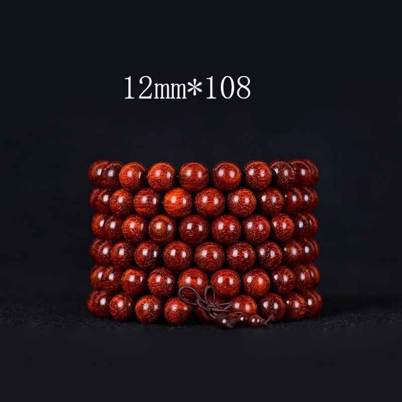Bracelet d'équilibre tibétain en petites feuilles de santal rouge avec Buddha Stones