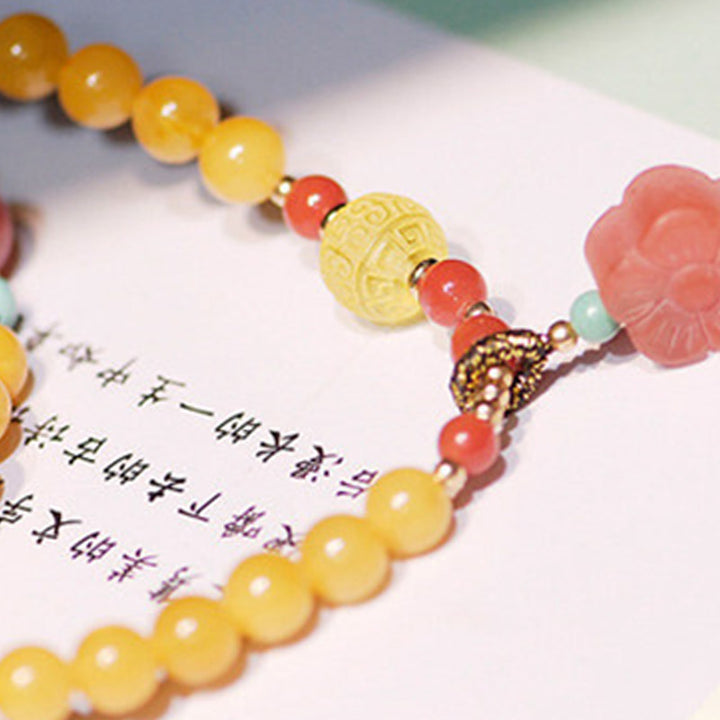 Collier d'équilibre et de guérison en ambre, bracelet à breloques en forme de fleur