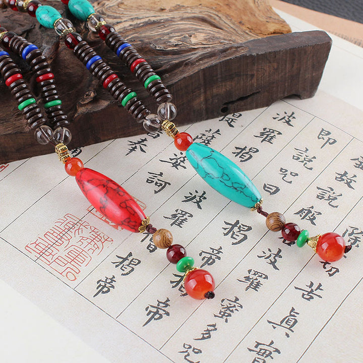 Collier pendentif Buddha Stones Wenge Wood Turquoise Stone Protection Calme