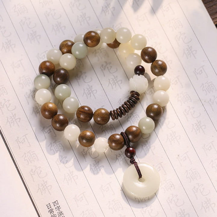 Bracelet double tour en harmonie avec boucle de paix en bois de santal vert et graines de Bodhi et Buddha Stones