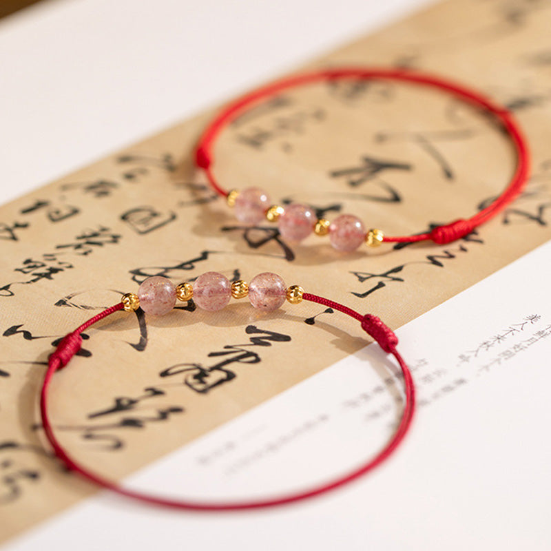 Bracelet de cheville en fil rouge avec perles en cristal de fraise et Buddha Stones