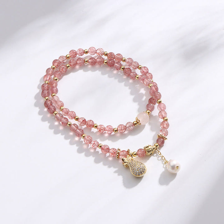 Bracelet double tour avec breloque positive et Buddha Stones en quartz fraise