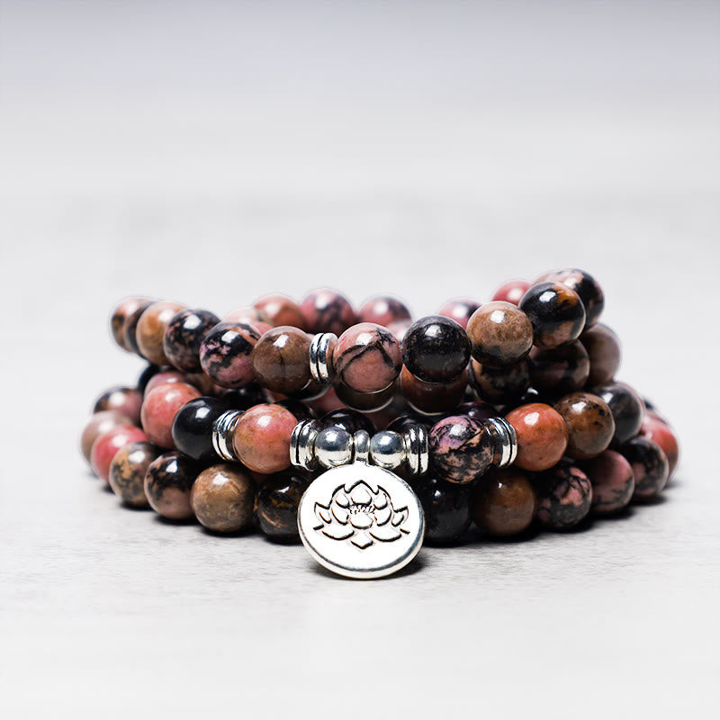 Bracelet Mala 108 Buddha Stones en rhodonite et lotus avec énergie de compassion