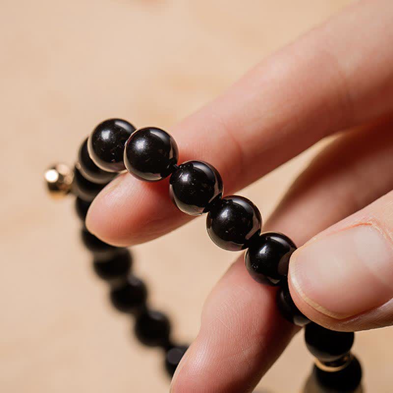 Bracelet magnétique pour couple en obsidienne Buddha Stones et jade Om Mani Padme Hum