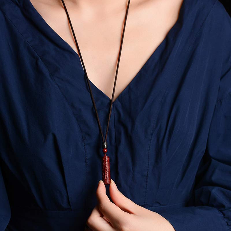 Collier de concentration de mantra tibétain en Buddha Stones en cinabre