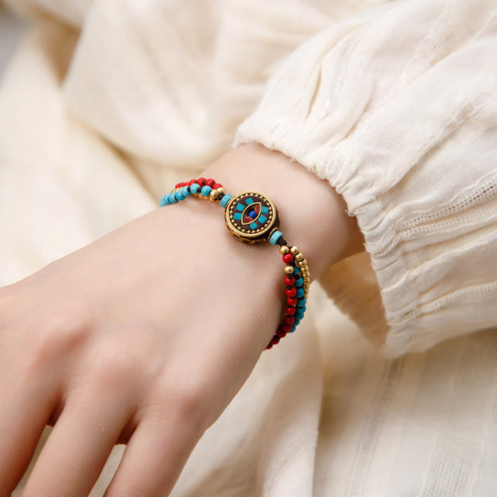 Bracelet de force de protection Om Mani Padme Hum en Buddha Stones tibétaines turquoise