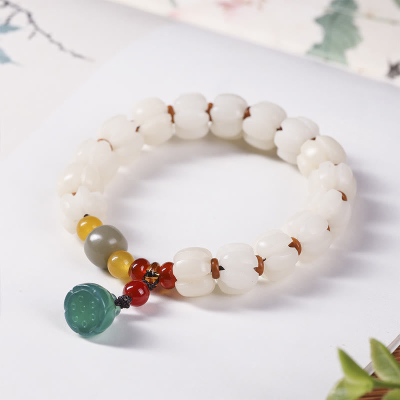 Bracelet en perles de citrouille gravées en agate rouge Bodhi Calme Harmonie Bodhi Graines naturelles Lotus