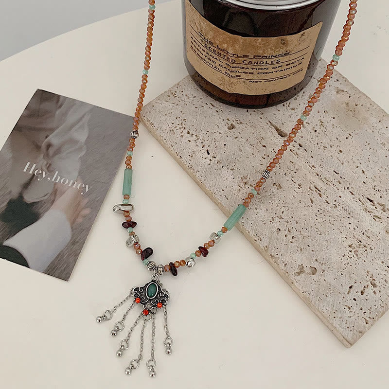 Collier pendentif pompon porte-bonheur en cuivre avec pierres de cristal tibétaines de Buddha Stones