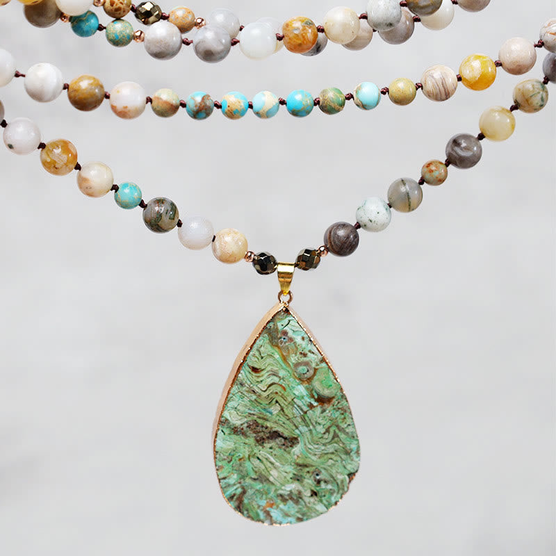 Collier de guérison en perles de jaspe Picasso naturel de l'océan Buddha Stones