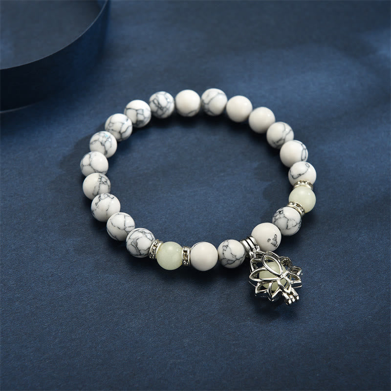 Bracelet de protection Lotus en perles lumineuses en turquoise tibétaine Buddha Stones