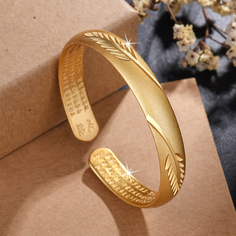 Bracelet manchette en cuivre avec Buddha Stones et plumes et cœur gravé