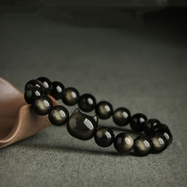 Bracelet de protection porte-bonheur en obsidienne dorée et argentée avec Buddha Stones et jolie patte de chat porte-bonheur - image 5