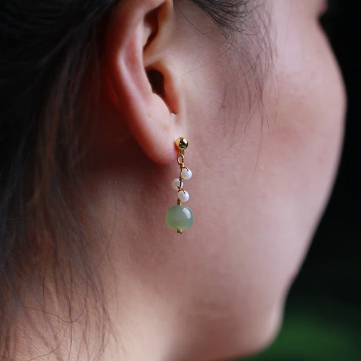 Boucles d'oreilles pendantes en plaqué or 14 carats avec motif de fleur de jade Hetian
