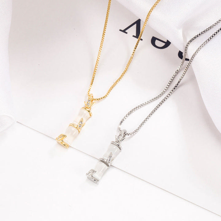 Collier pendentif harmonieux en calcédoine et bambou avec Buddha Stones