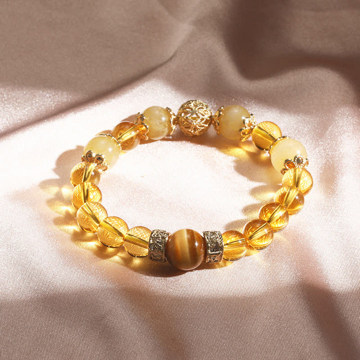 Bracelet de perles de prospérité et de générosité en Buddha Stones et citrine