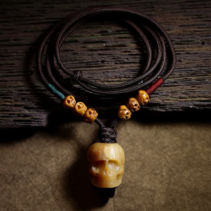 Collier pendentif en os de chameau tibétain Buddha Stones et crâne du Seigneur des cadavres