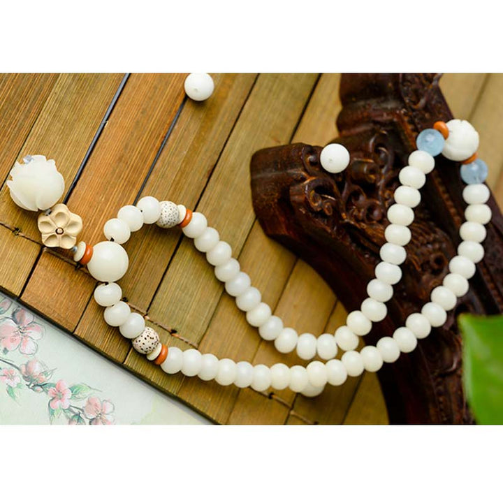 Bracelet de bénédiction Bodhi Lotus en jade blanc tibétain Buddha Stones