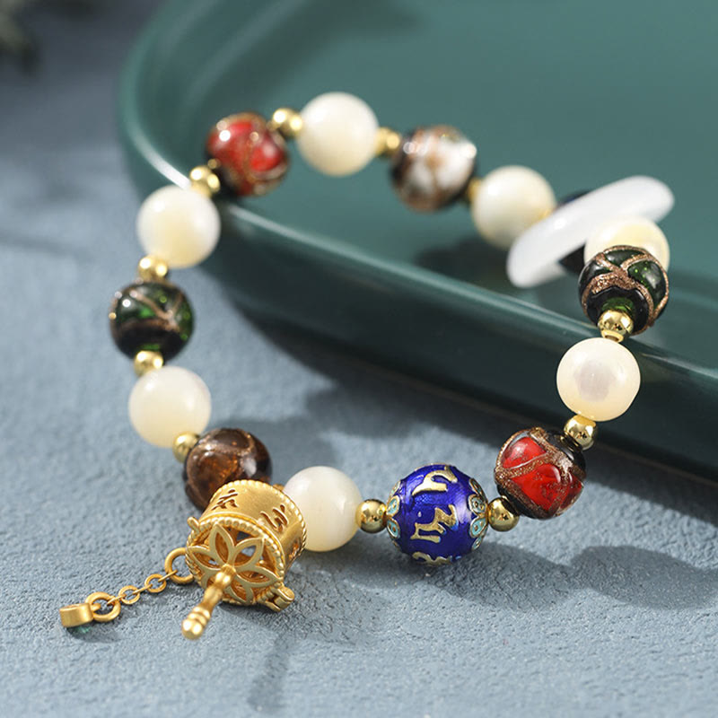 Buddha Stones Encens tibétain Cendres Verre Liuli Pierre Tridacna Pierre de Soleil Om Mani Padme Hum Bracelet à breloques pour roue de prière