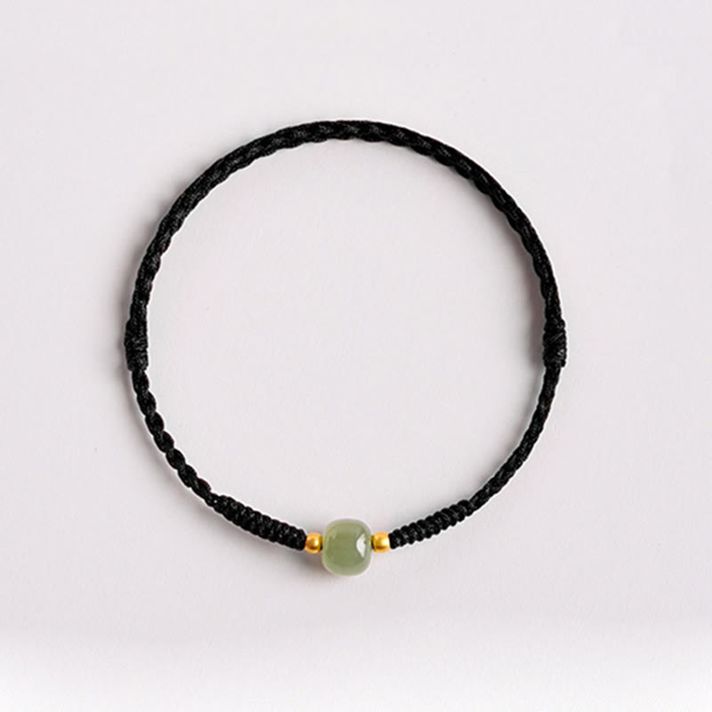 Bracelet tressé en perles de jade porte-bonheur et prospérité fait main avec Buddha Stones
