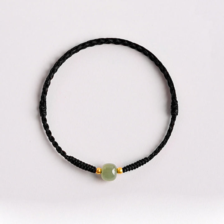 Bracelet tressé en perles de jade porte-bonheur et prospérité fait main avec Buddha Stones