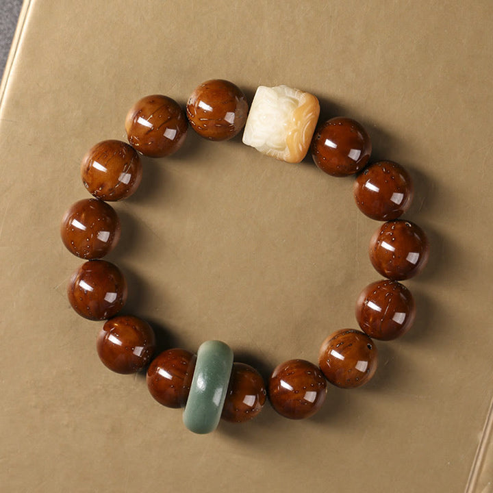 Bracelet de sagesse du lion dansant en Buddha Stones et graines de Bodhi violettes