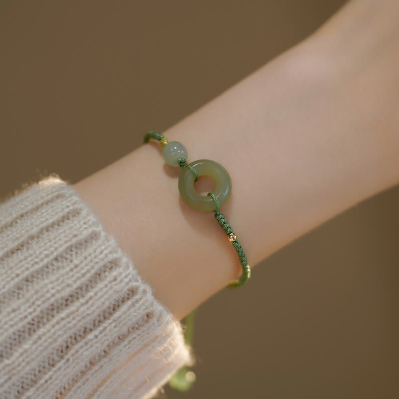 Bracelet en corde avec perles porte-bonheur et breloque en jade et Buddha Stones
