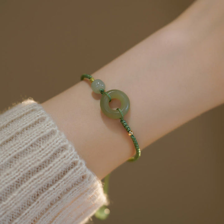Bracelet en corde avec perles porte-bonheur et breloque en jade et Buddha Stones