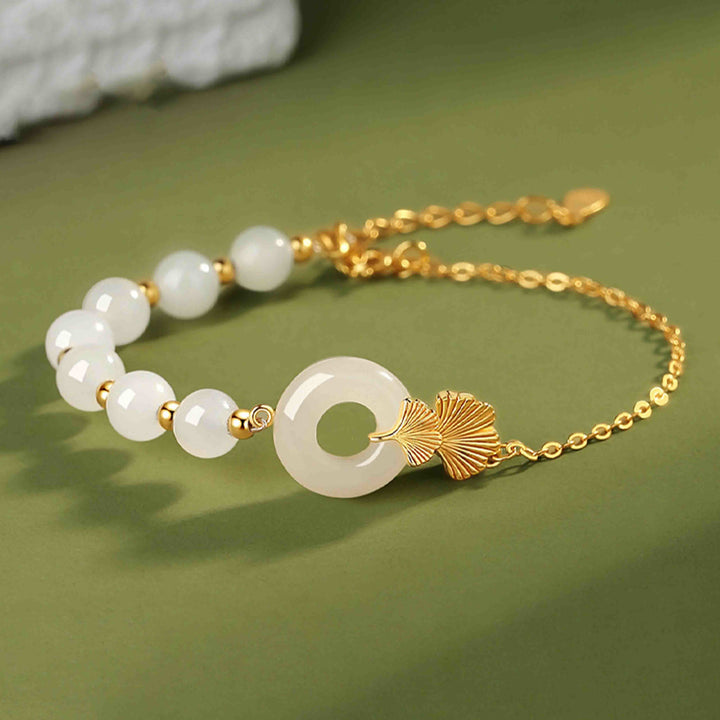 Bracelet Buddha Stones -bonheur en argent sterling 925 avec boucle de paix en jade blanc Hetian et feuilles de ginkgo - Jade blanc de Hetian (Protection ♥ Bénédiction) - image 0