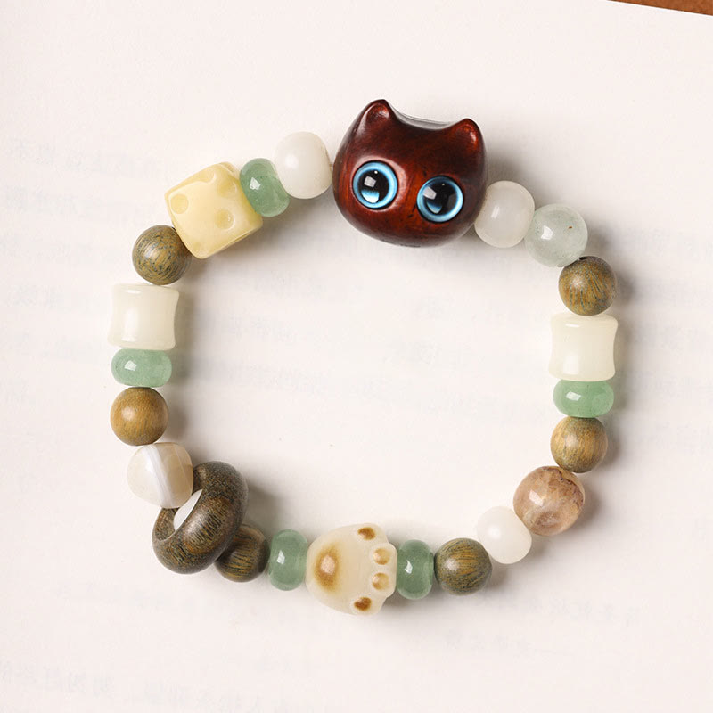 Buddha Stones Graine de Bodhi Bois de santal vert Bois d'ébène Petite feuille Bois de santal rouge Tête de chat Patte Griffe Bracelet de paix - image 12
