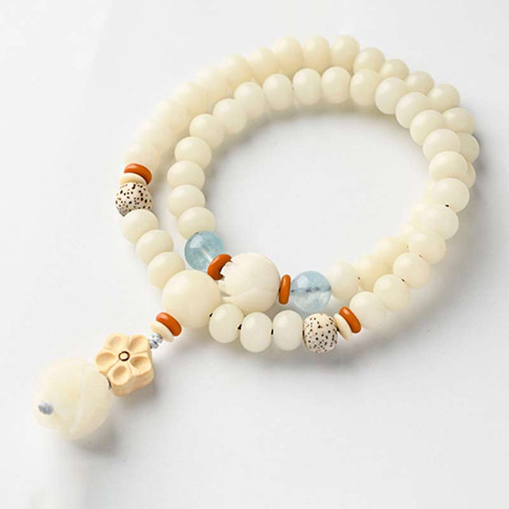 Bracelet de bénédiction Bodhi Lotus en jade blanc tibétain Buddha Stones