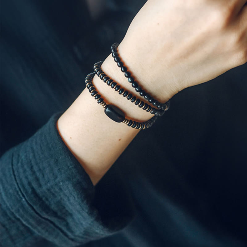 Bracelet triple tour de guérison en cuivre et bois d'ébène avec Buddha Stones arc-en-ciel et obsidienne