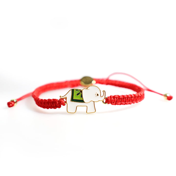 Bracelet tibétain en argent sterling 925 fait main avec des Buddha Stones et un éléphant porte-bonheur rouge