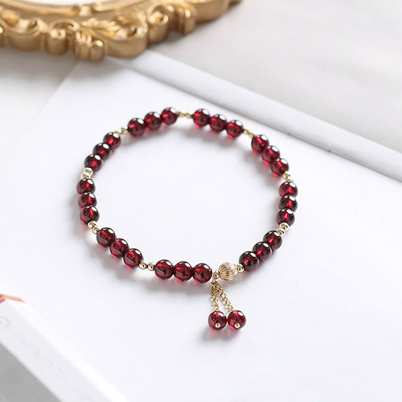 Bracelet Buddha Stones en alliage plaqué or 14 carats et grenat naturel apaisant - image 1