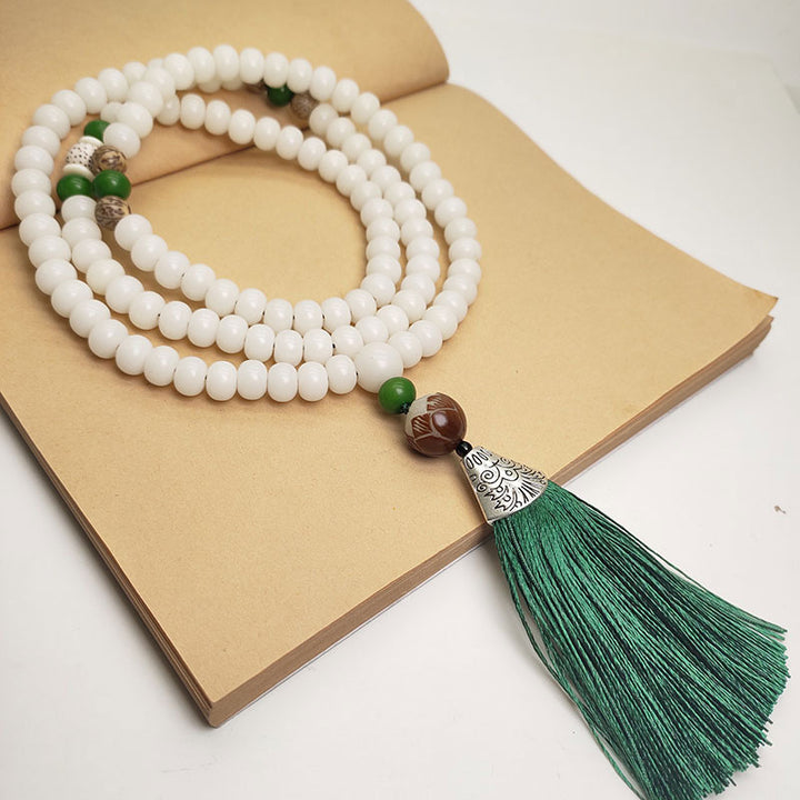 Bracelet de protection en 108 perles de Mala en graines de Bodhi blanches
