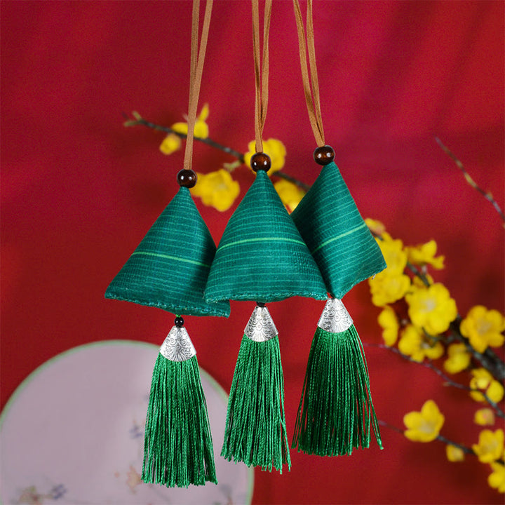 Décoration à suspendre avec pompon et sachet de protection en forme de sachet de protection pour le festival des bateaux Buddha Stones