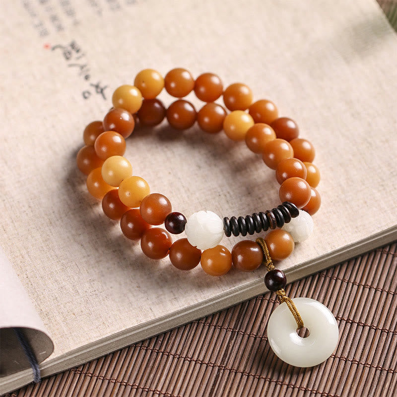 Bracelet double tour en jade et pierre de Buddha Stones avec boucle de paix et sagesse