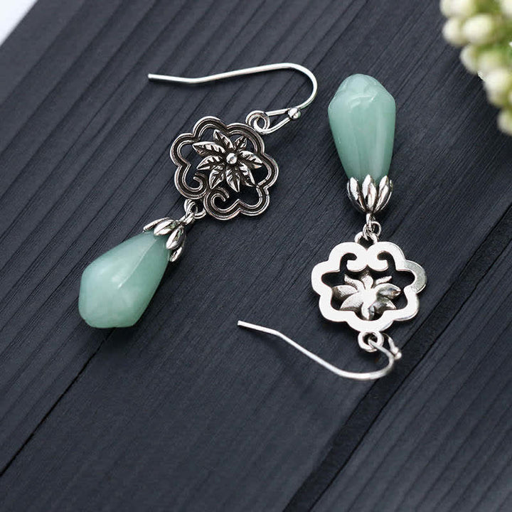 Boucles d'oreilles pendantes en jade et fleur de magnolia Buddha Stones