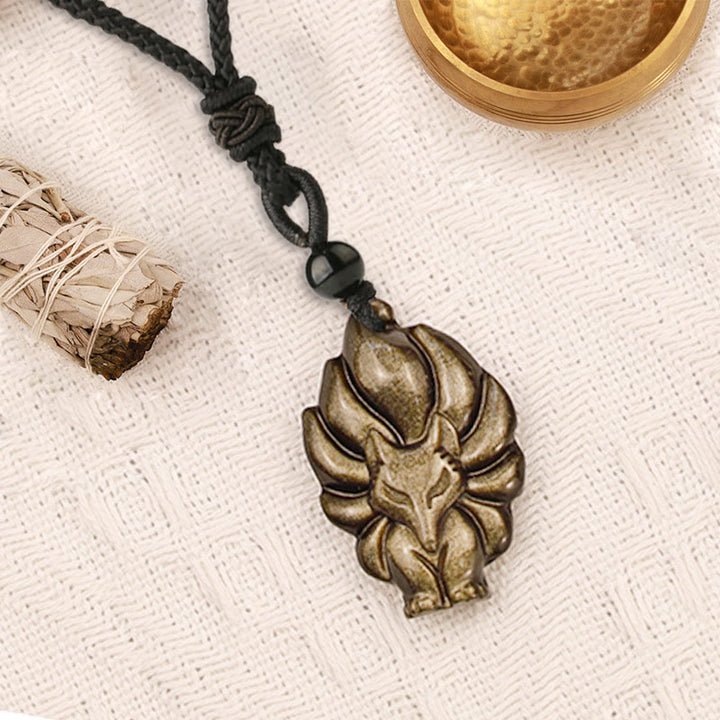Collier de protection avec pendentif en Buddha Stones dorés