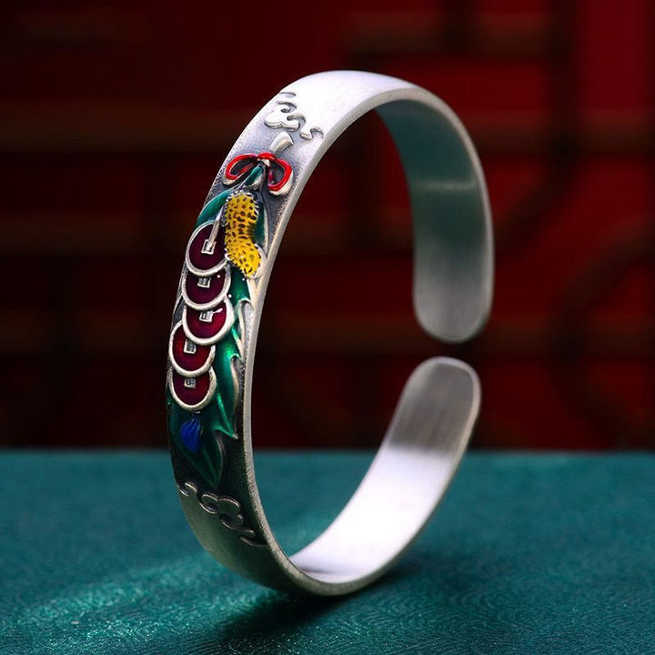 Bracelet Feng Shui en Buddha Stones avec cinq pièces de monnaie de l'empereur et cacahuètes