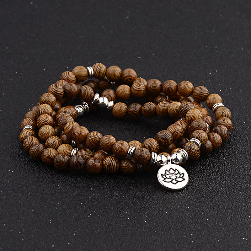 Bracelet tibétain en bois avec Buddha Stones et foudre