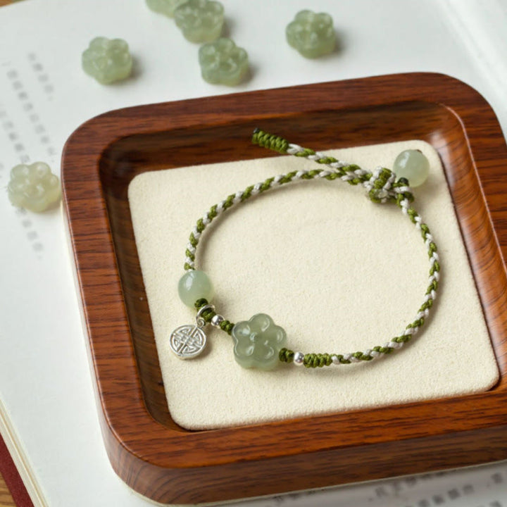 Bracelet tressé en jade fait main avec des Buddha Stones et des fleurs de prunier