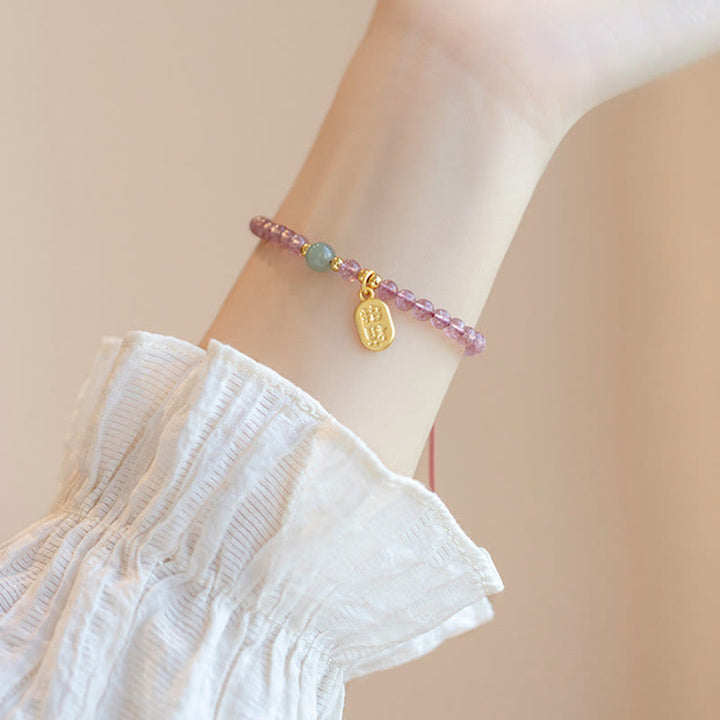 Bracelet porte-bonheur en Buddha Stones, quartz fraise, grenat, jade, caractère Fu
