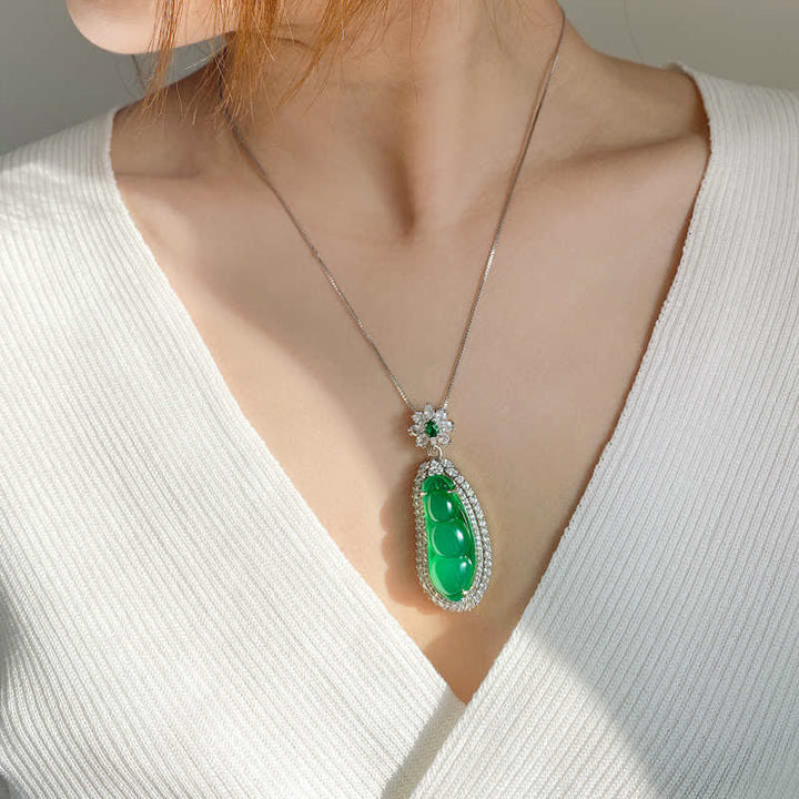 Collier pendentif porte-bonheur en jade cyan Fortune Bean